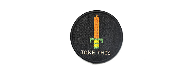 APRILLA DESIGN ITS DANGEROUS TO GO ALONE! TAKE THIS. EMBROIDERED PATCH (BLACK)